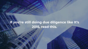 Modern glass skyscrapers viewed from below with the text “If you’re still doing due diligence like it’s 2015, read this.” symbolizing innovation and modernization in investment research.